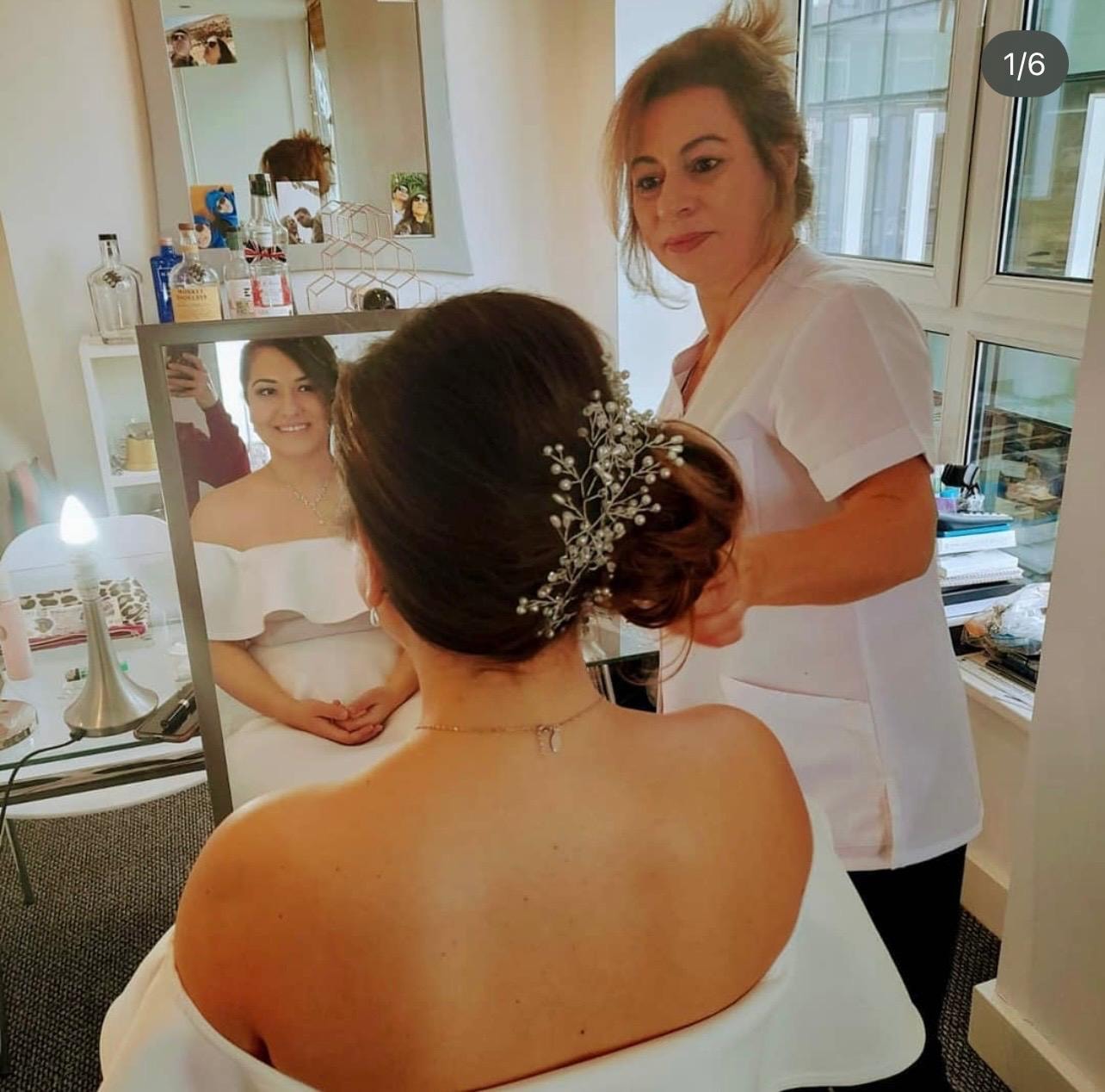 Bridal updo — elegant pearl hair accessory finish